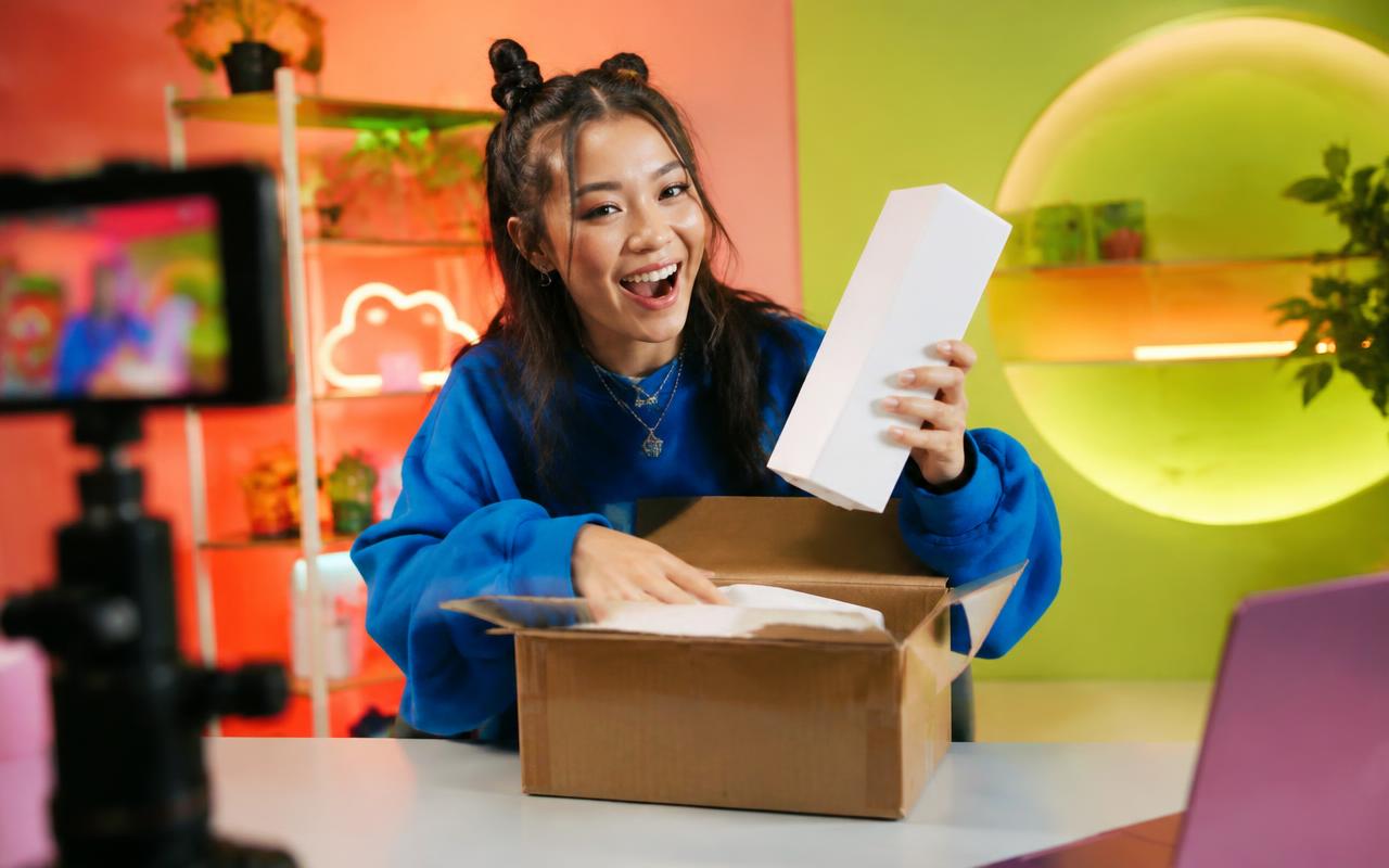 Creator filming a product unboxing